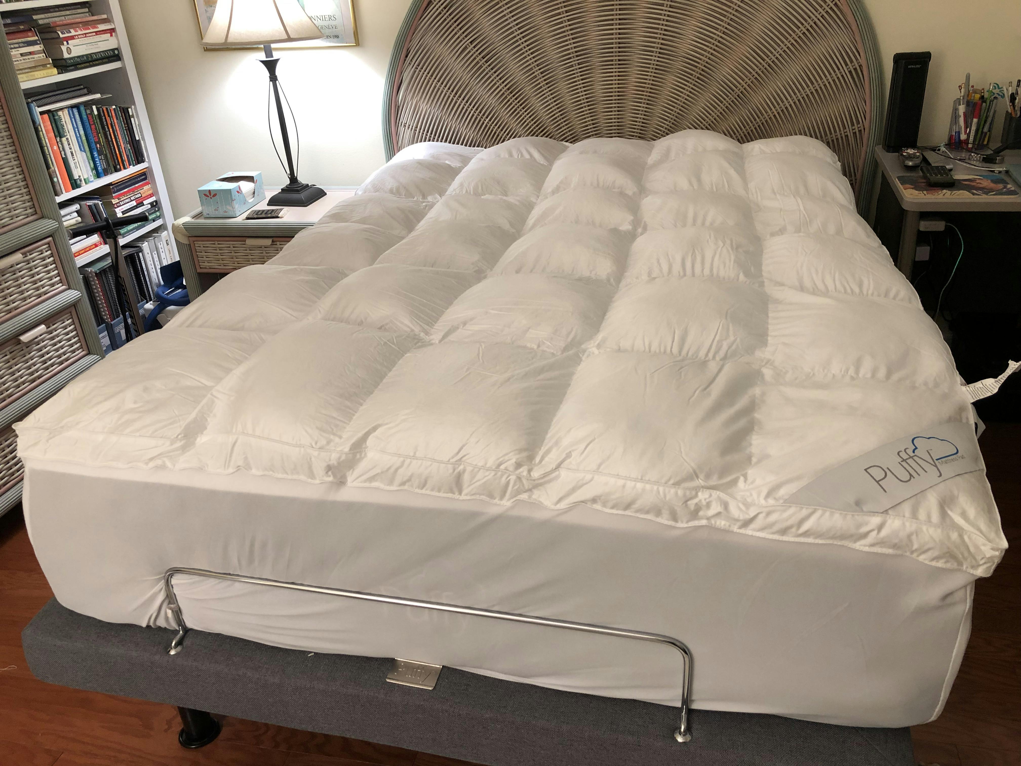 puffy lux king mattress in a small room