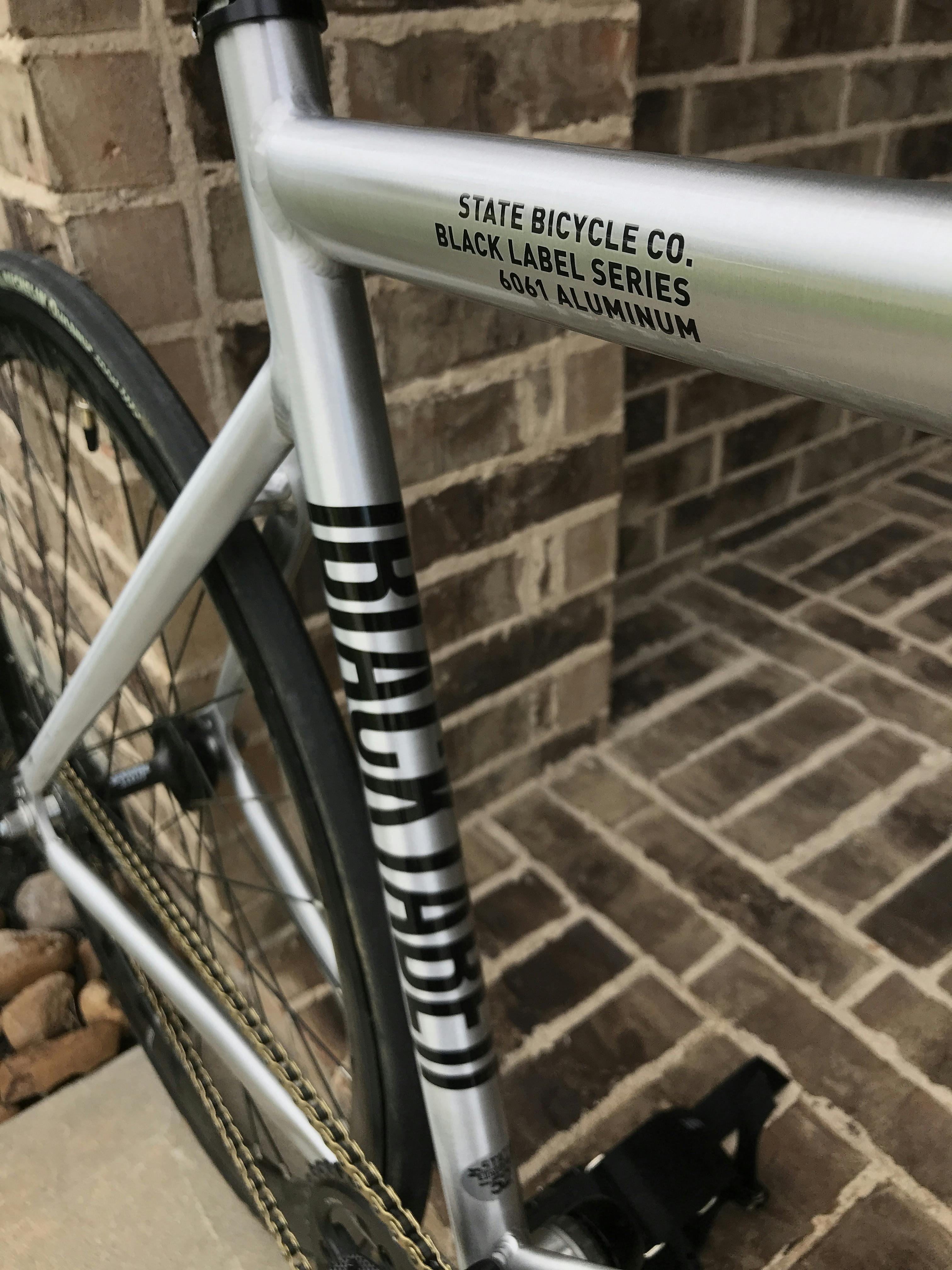 raw aluminum bike frame