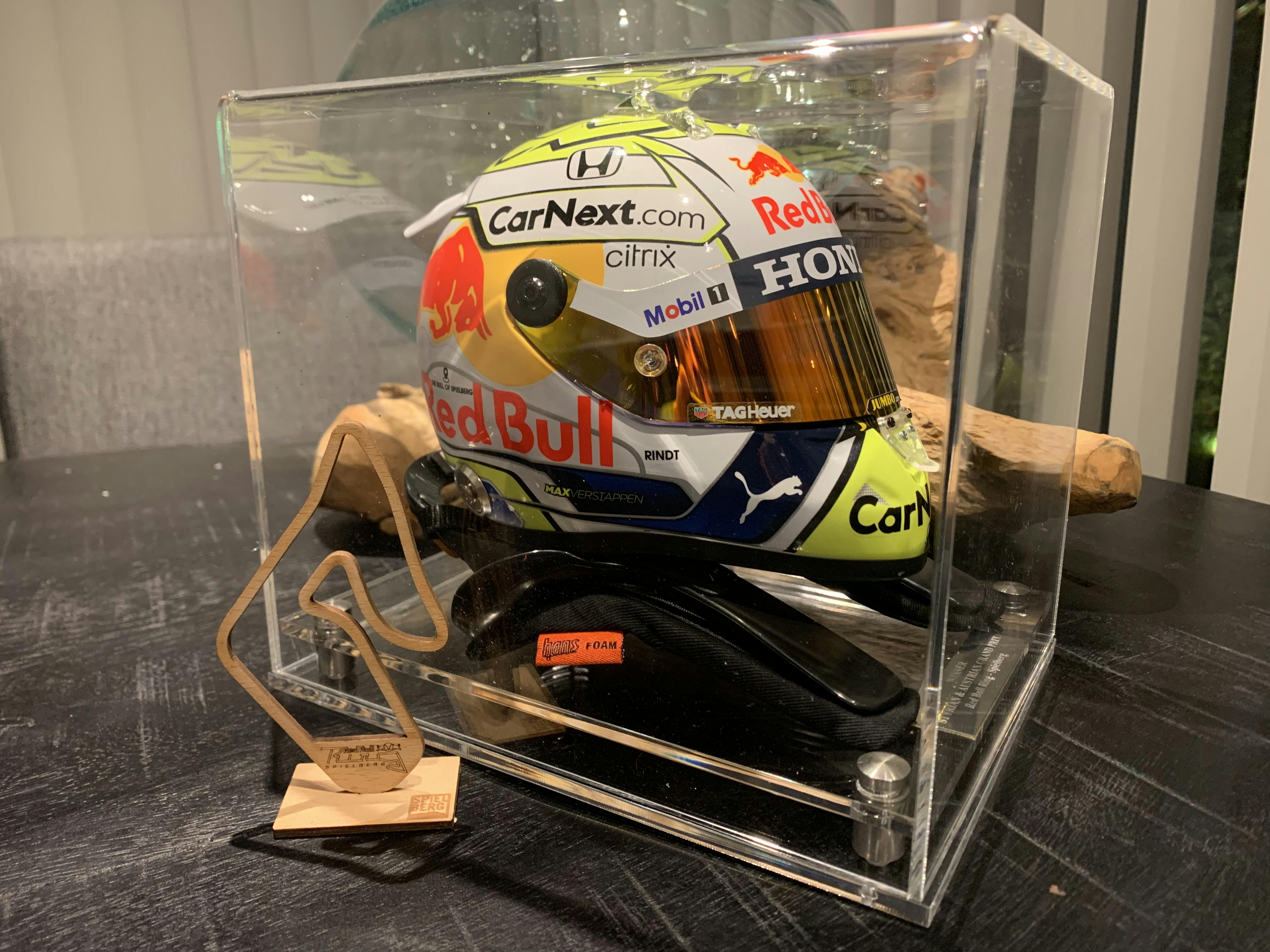 Half Scale F1 Helmet Display Case with a Modern Base