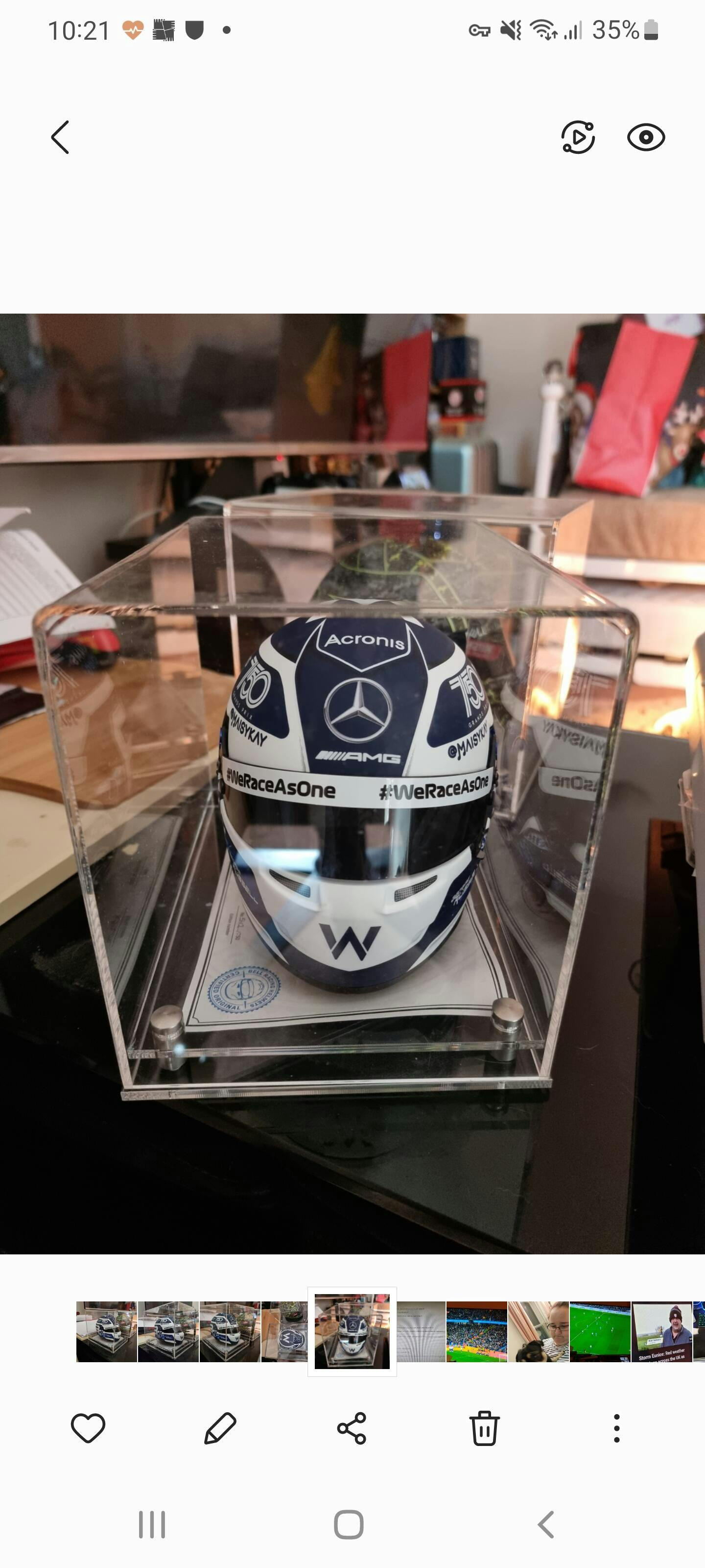 Half Scale F1 Helmet Display Case with a Modern Base