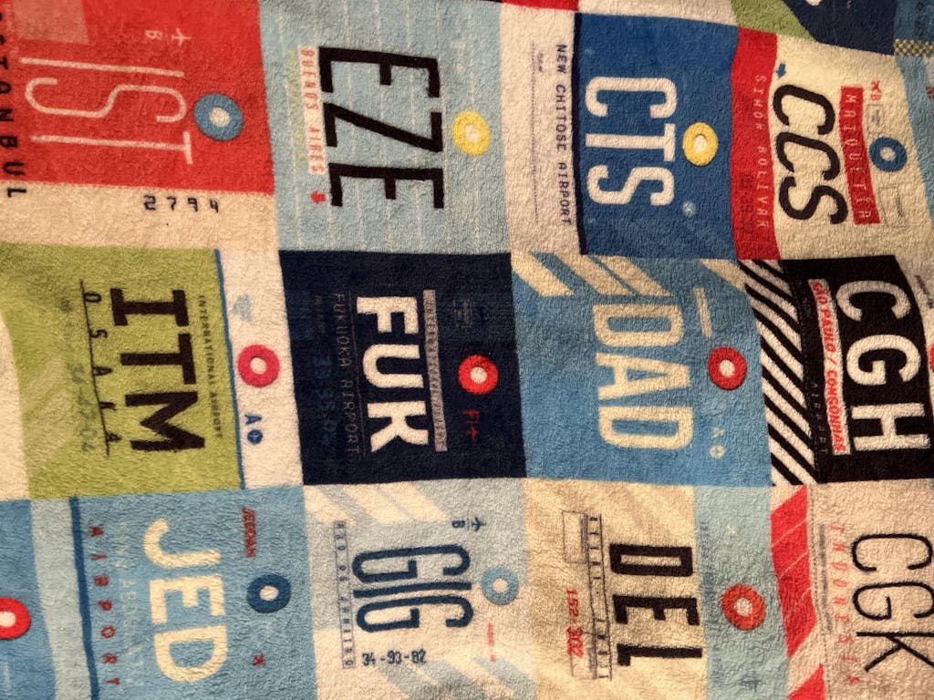 Throw Blanket GRU airport code pattern.
