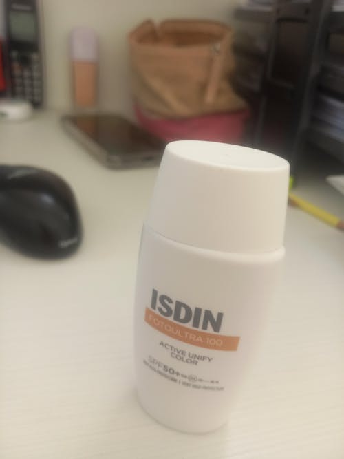 Isdin FotoUltra 100 Active Unify Fluido con Color FPS50+ 50ml.