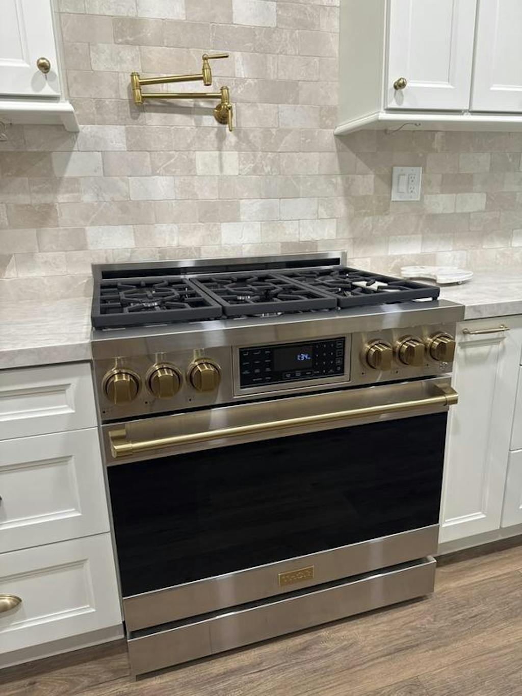Gordon Ramsay by THOR Kitchen 36" 6.0 cu. ft. Professional Natural Gas Range with Tilt Panel Touch Control, Self-Clean and Air Fry in Stainless Steel with Bronze Accents- RSG36-BRZ
