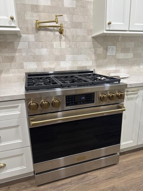 Gordon Ramsay by THOR Kitchen 36" 6.0 cu. ft. Professional Natural Gas Range with Tilt Panel Touch Control, Self-Clean and Air Fry in Stainless Steel with Bronze Accents- RSG36-BRZ