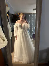 Boho A Line Floral Wedding Dress with Long Puffy Sleeves and Deep V-Neck