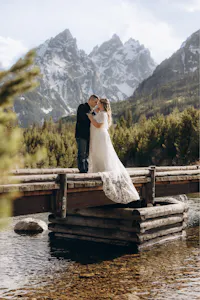 Boho A-Line Chiffon Wedding Dress with Lace Flowers, Cape Sleeve and Backless Design