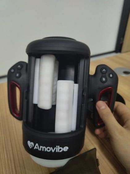 Rubbing Masturbator with Vibration, Warming Function & Phone Mount – Amovibe