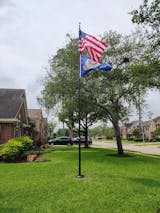 Daytime view of flagpole ready for night lighting