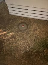 Flagpole installation with solar lighting