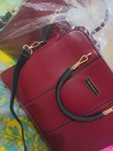 "Buy one bag get one earing FREE"                                   Handbag with Dual Handles