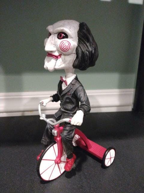 Saw's Billy the Puppet NECA Bobblehead Head Knocker