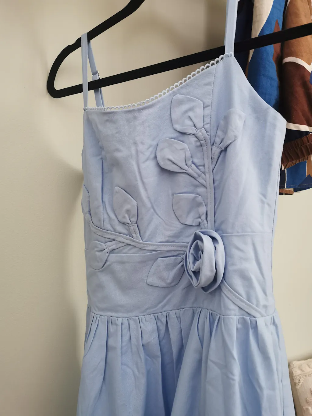 Trudy | Blue Midi Dress with Pleated Skirt & Floral Appliqué