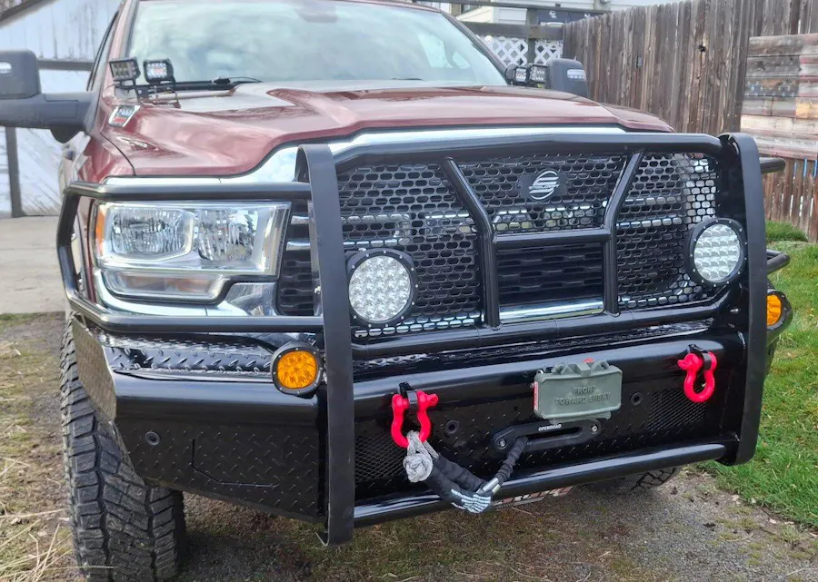 Ram 2500 with a black grille guard bumper, customer build