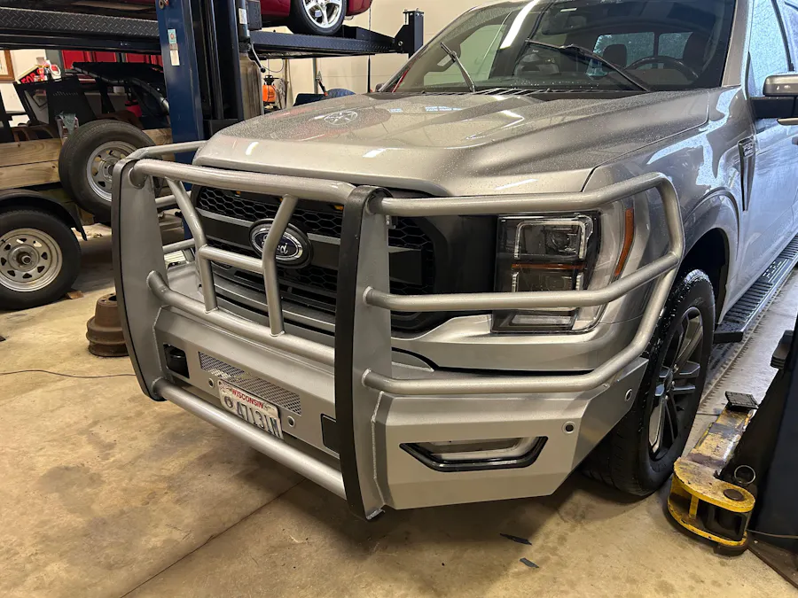 Ford F150 with a polished grille guard bumper, customer build