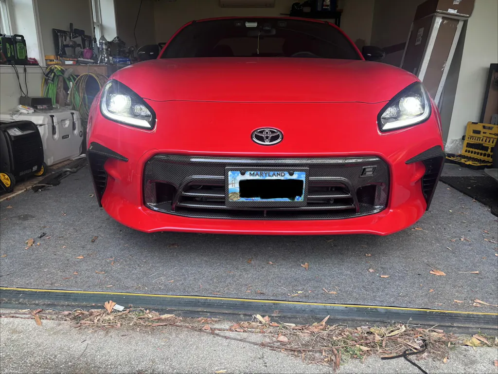 Carbon Fiber License Plate Frame - 2 Holes Wide Bottom - Gloss Finish