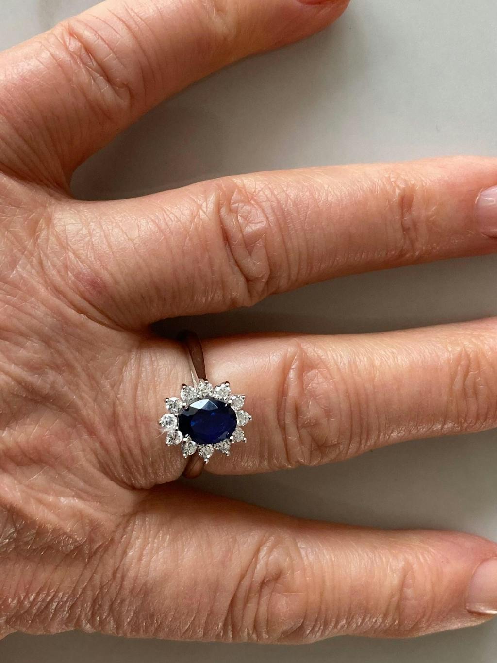 925 Sterling Silver Oval Blue Sapphire Cz Regal Halo Ring