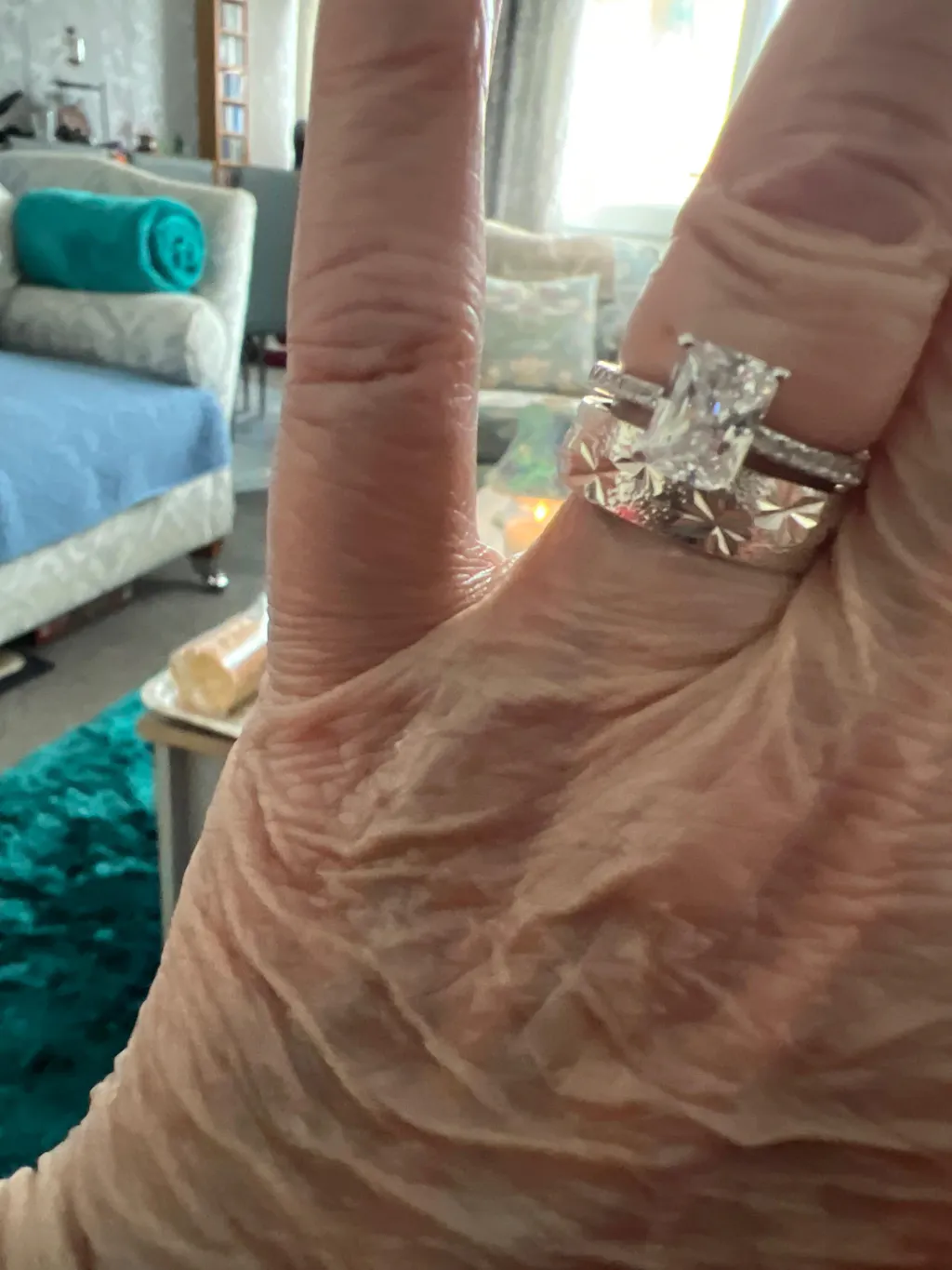 925 Sterling Silver Cz Emerald Cut with Round Cz Shoulders Ring