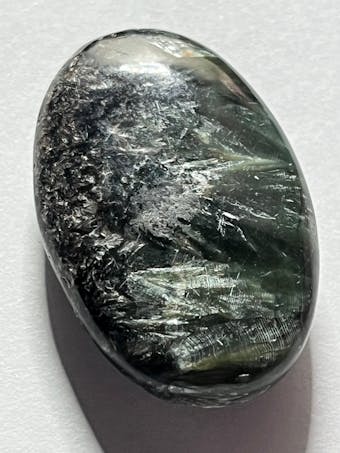 Seraphinite Oval Pocket Stones - lots of flash