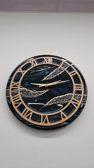 Shiny Ocean With Gold Bezel Resin Wall Clock
