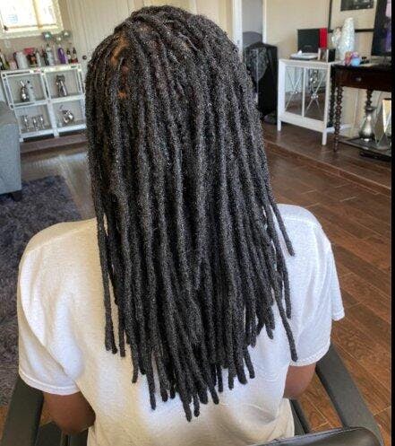 sister locs with curly ends
