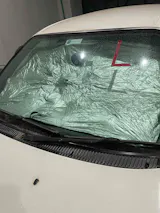 Car Windshield Sunshade Umbrella in Pakistan | 99% UV Block – Foldable Heat & UV Shield Cover