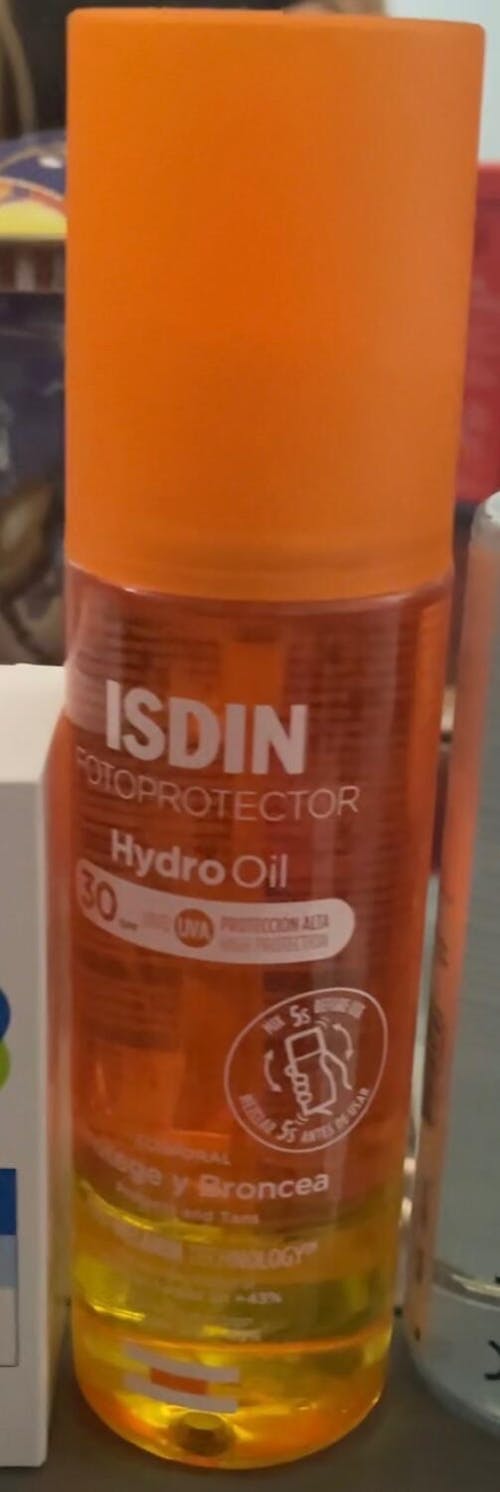 Isdin Fotoprotector Isdin Hydro Oil SPF 30, bifásico que protege y broncea la piel 200ml.