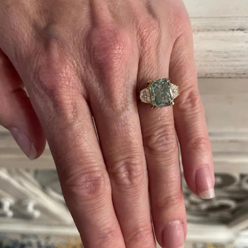 8.10 Carat Radiant Cut Light Green Moissanite Three Stone Ring