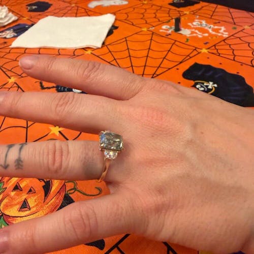 8.10 Carat Radiant Cut Light Green Moissanite Three Stone Ring