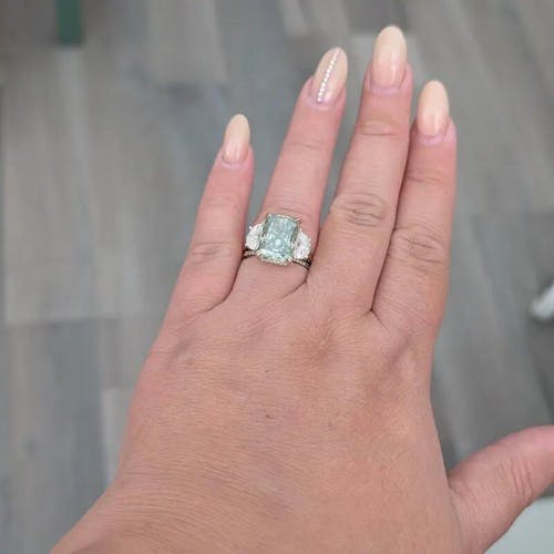 8.10 Carat Radiant Cut Light Green Moissanite Three Stone Ring