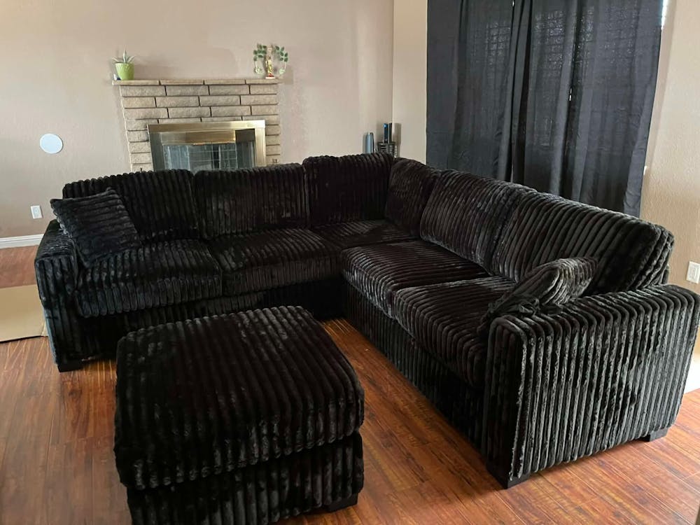 Midnight Haven Black Corduroy Sectional with Ottoman
