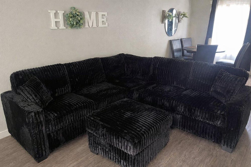 Midnight Haven Black Corduroy Sectional with Ottoman