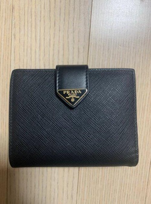 프라다 사피아노 및 가죽 반지갑 블랙 1MV204