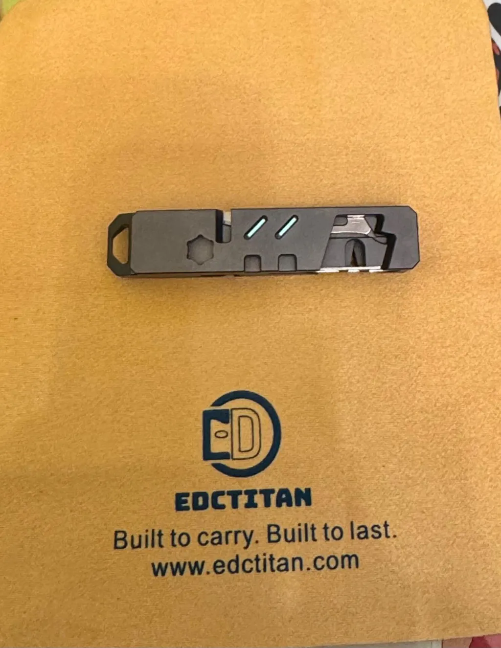 The TriPro Stand: 15-in-1 Titanium EDC Tool and Phone Stand