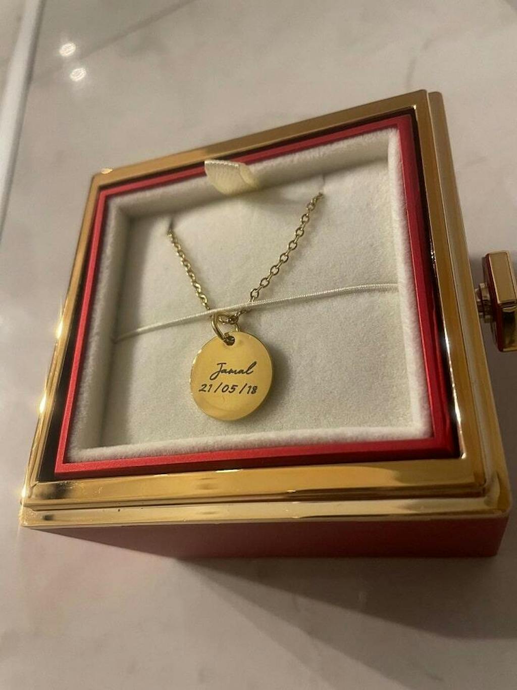 Plättchenkette mit Text