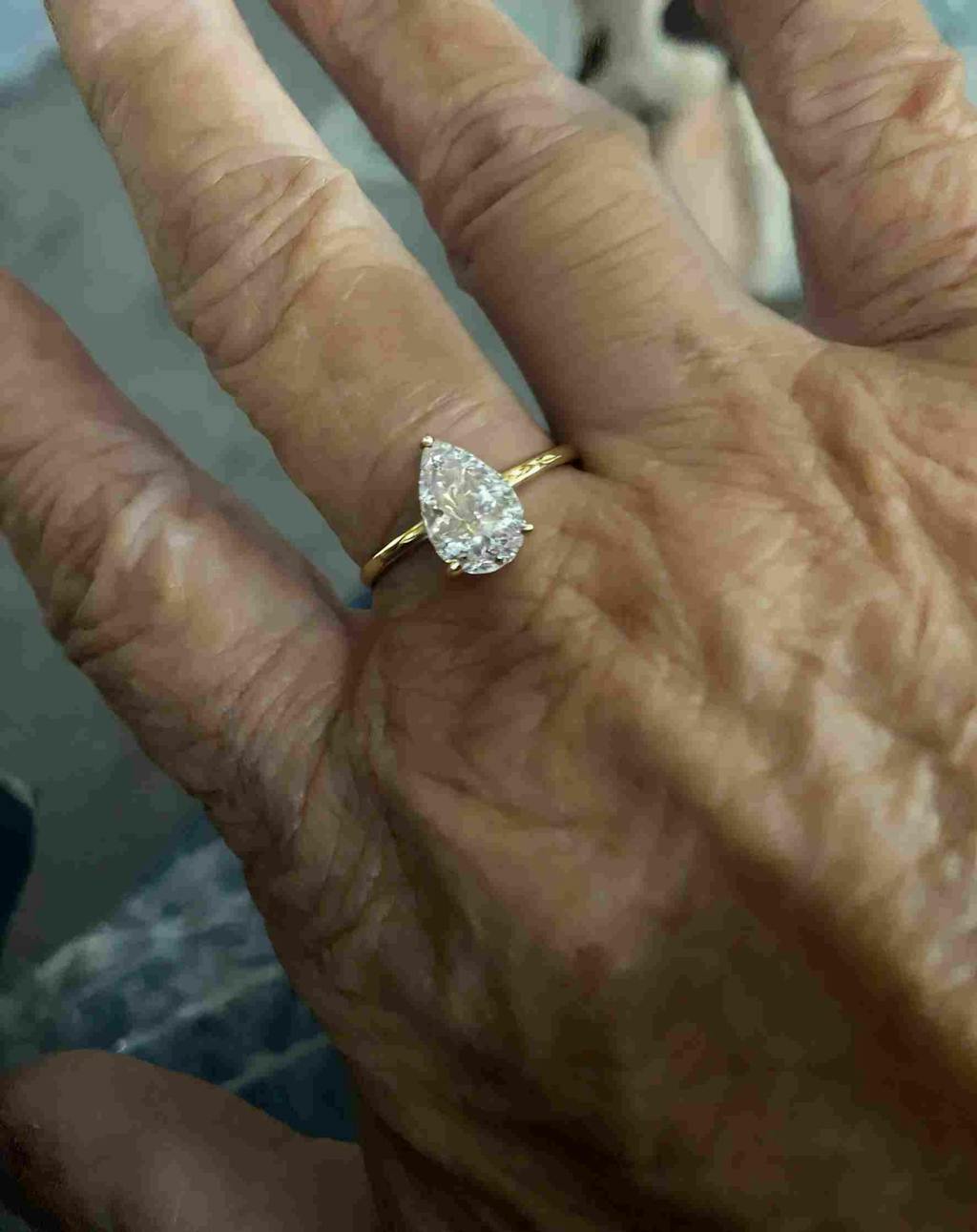 Golden Teardrop 2Ct Pear Cut Simulated Diamond Engagement Ring in Yellow Gold Plated Silver