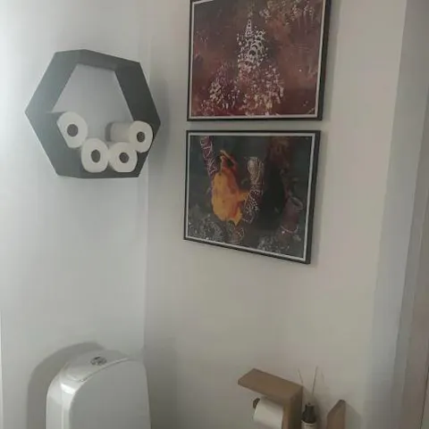 Customer photo of floating hexagon wall shelf