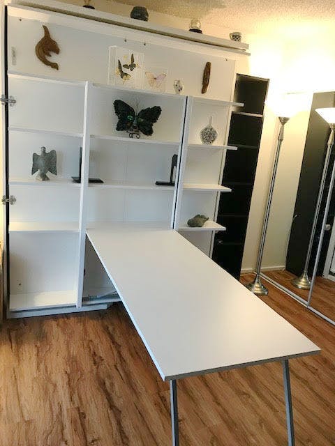 https://judgeme.imgix.net/expand-furniture-folding-tables-smarter-wall-beds-space-savers/1557268779__Revolving-bed-22__original.jpg?auto=format