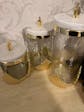Glass Canister w/Marble Lid & Gold Symetrical Design
