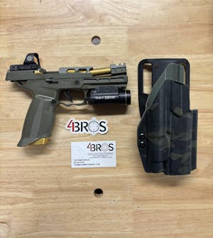 Sig Sauer P320 with TLR-1 Gas Pedal Competition Holster