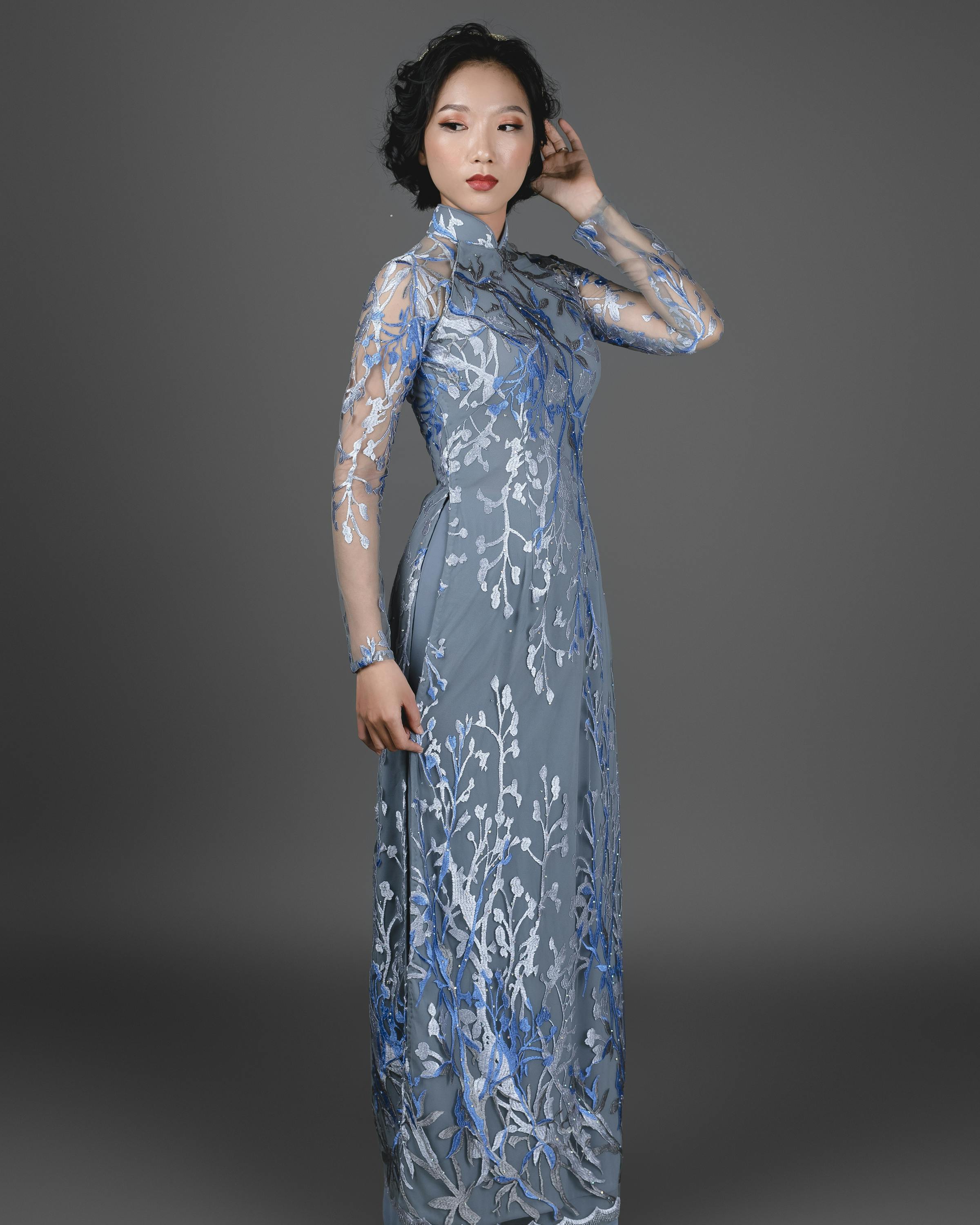 Ao dai Vietnam traditional dress. Blue silk long dress with