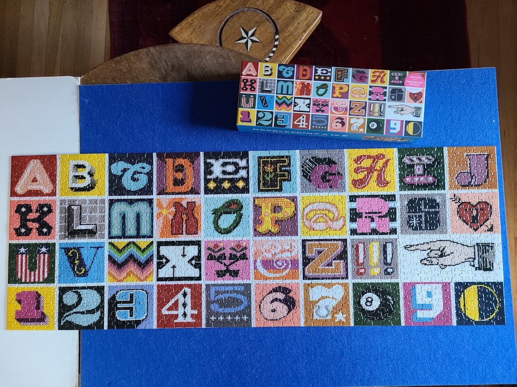 Needlepoint A to Z 1000 Piece Panoramic Puzzle Galison