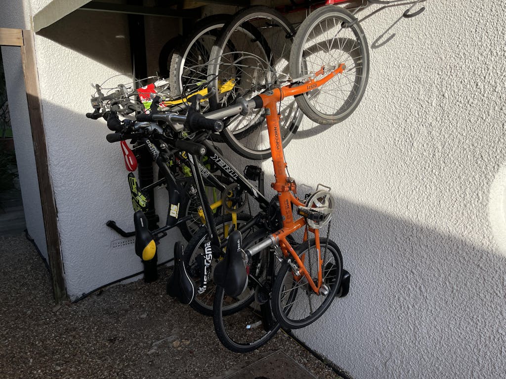 Bike Storage Ideas Hang Bike On Wall Vertically By The Front Wheel