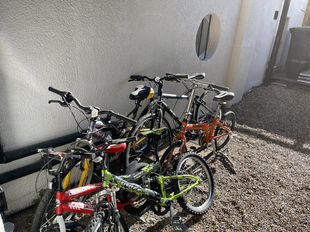 Bike Storage Ideas Hang Bike On Wall Vertically By The Front Wheel