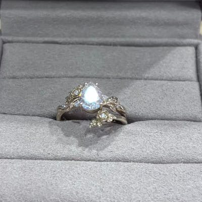 Rose Blossom: Pear-Cut Moissanite Floral Ring Set - Camille