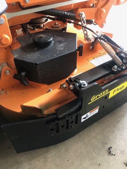 A1 - GrassFlap® brand chute blocker No-Drill Mount for Scag mowers wit