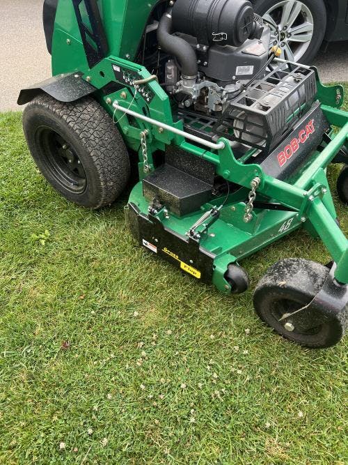 61E70-5-A15 Low Profile GrassFlap® brand chute blocker with Steel Bloc