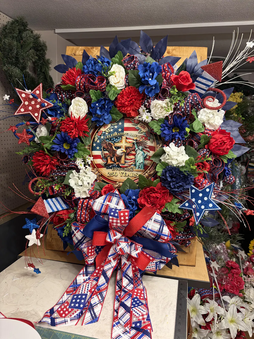 Red, white, and blue mixed flower bush
