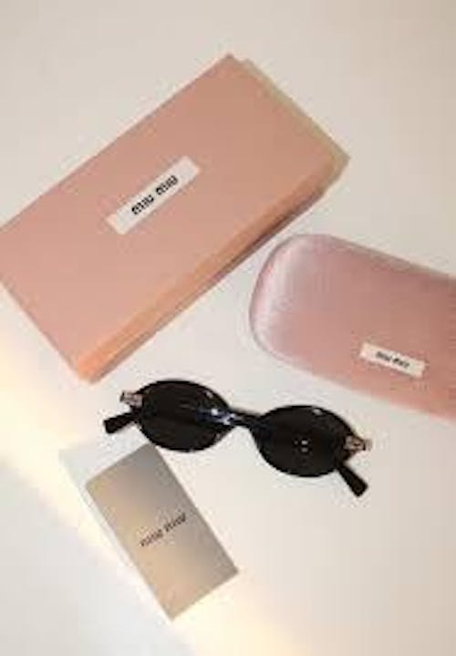 Miu Miu Regard Sunglasses