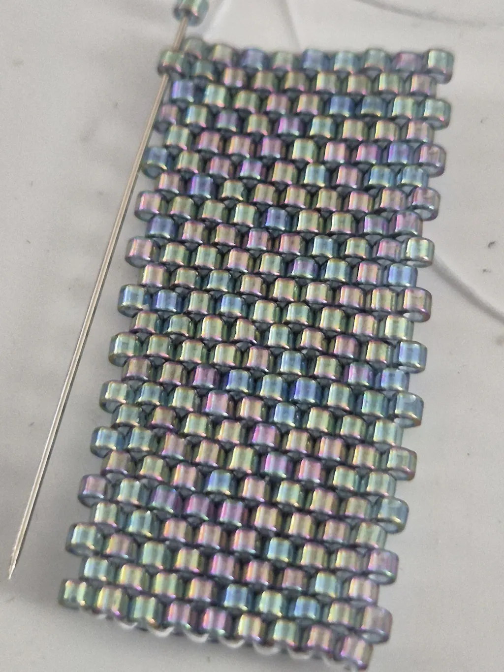 Miyuki Delica - Gold luster transparent blue grey rainbow 11/0, 5 gram