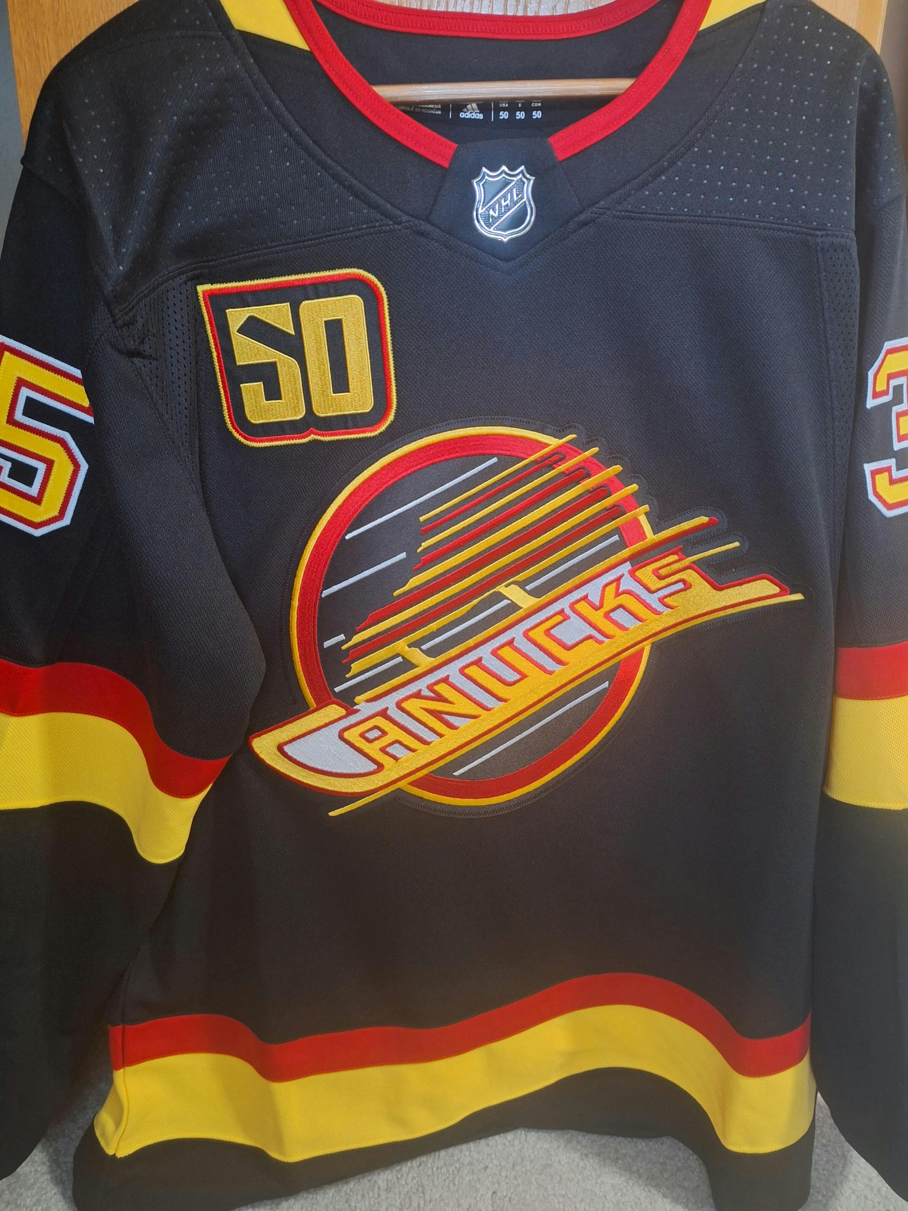 adidas black red & green skate jersey